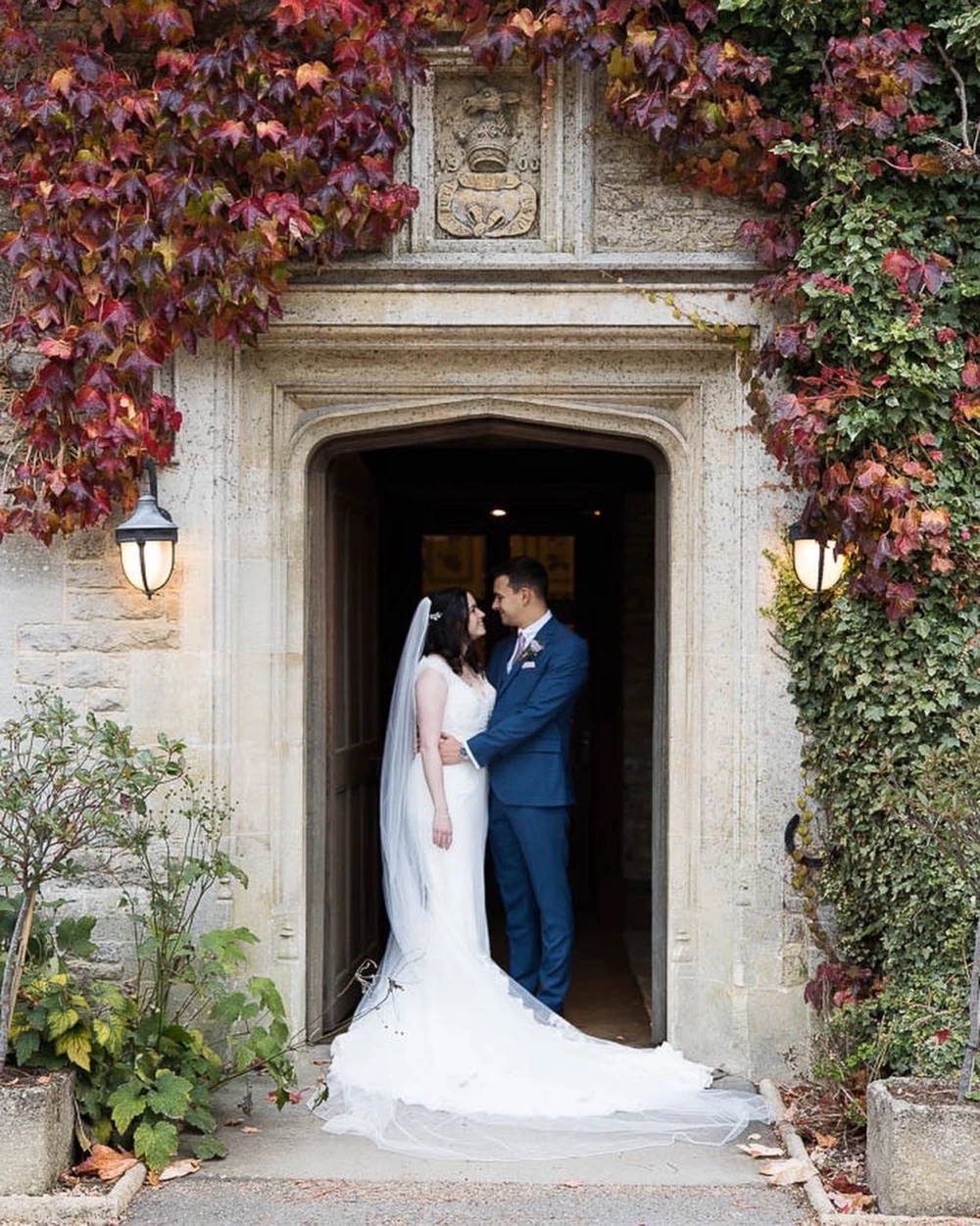 Bride and groom in a doorway