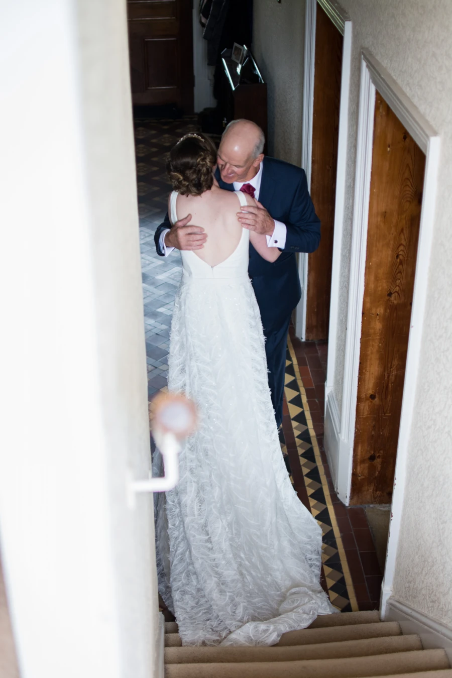 Father hugging his daughter before the wedding